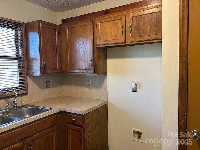 2601 Bob White Circle Wingate, NC 28174 - Photo 11 of 25 a kitchen with a sink cabinets and a window