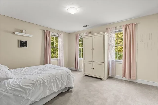 a view of a bedroom with closet area