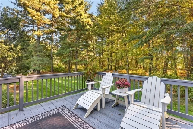 a view of roof deck with furniture