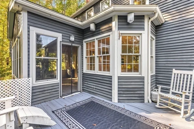 a front view of a house with a large window