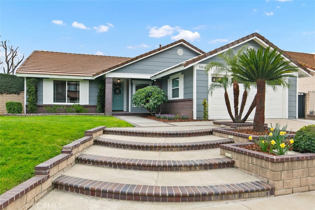 1004 Wellington Road San Dimas, CA 91773 - Photo 1 of 1 a view of house with a garden and plants