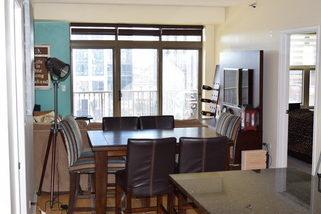 1250 South Indiana Avenue, Unit 606 Chicago, IL 60605 - Photo 10 of 16 a view of a dining room with furniture and a window