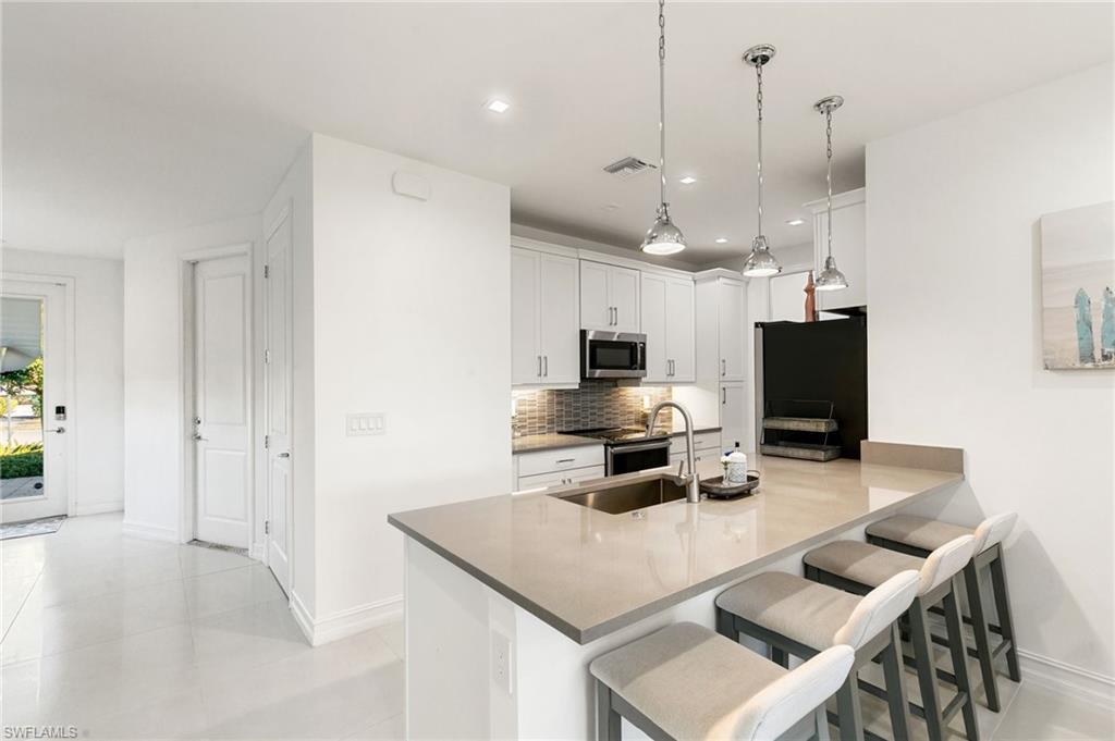 7437 Rockefeller Drive Naples, FL 34119 - Photo 5 of 32