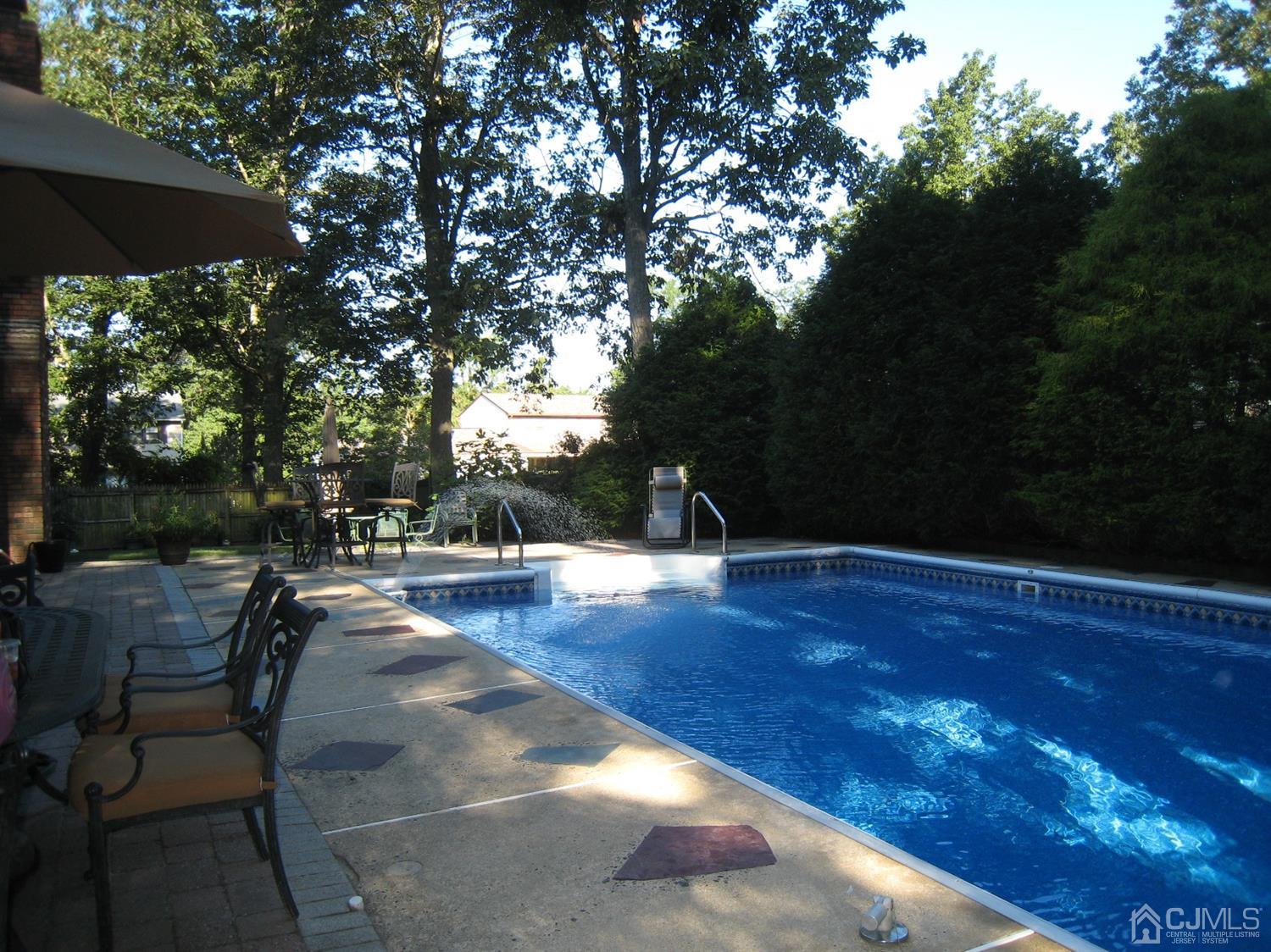29 Revock Road East Brunswick, NJ 08816 - Photo 3 of 40 a view of a backyard with sitting area