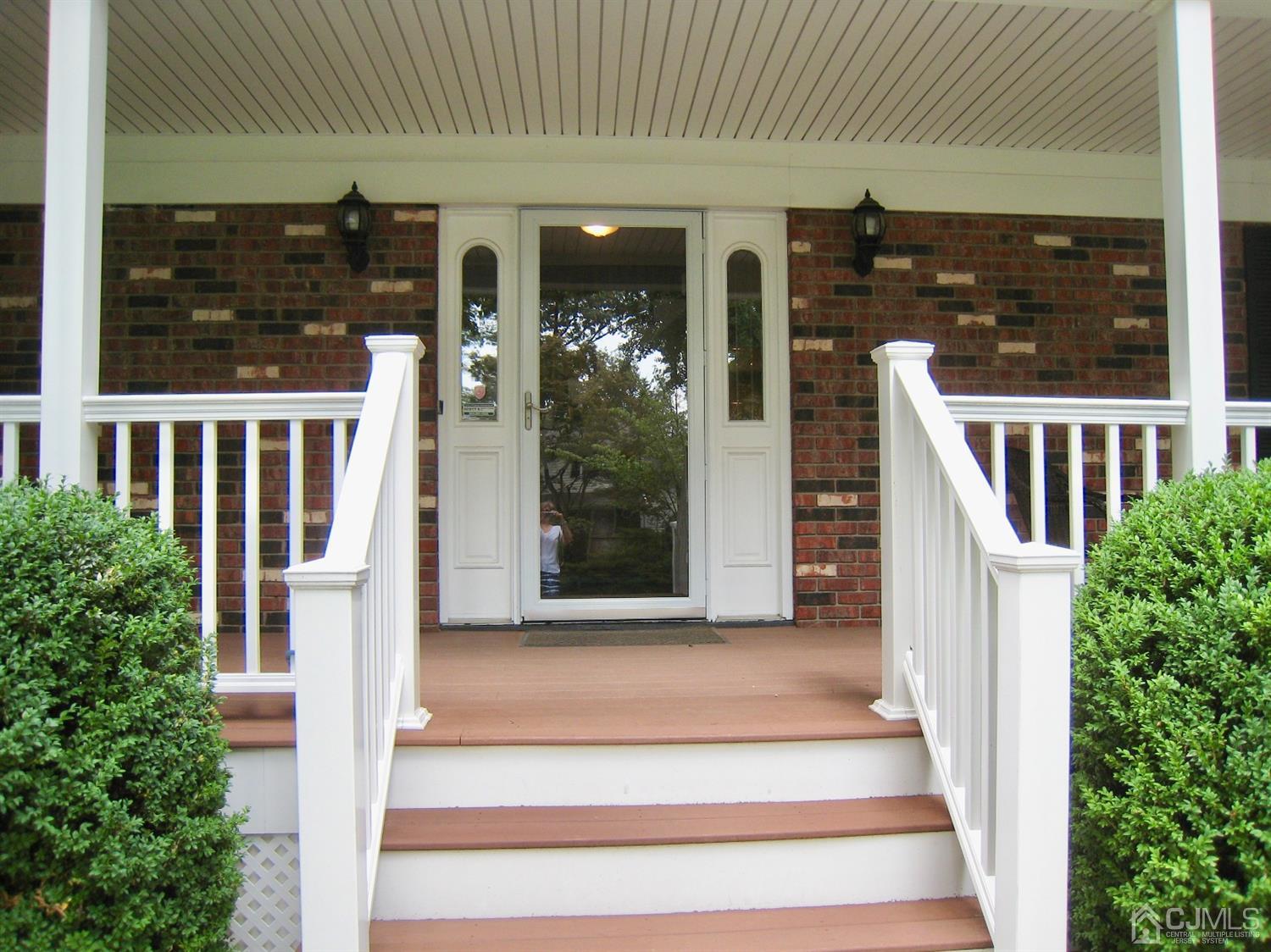 29 Revock Road East Brunswick, NJ 08816 - Photo 40 of 40 a front view of a house with entryway