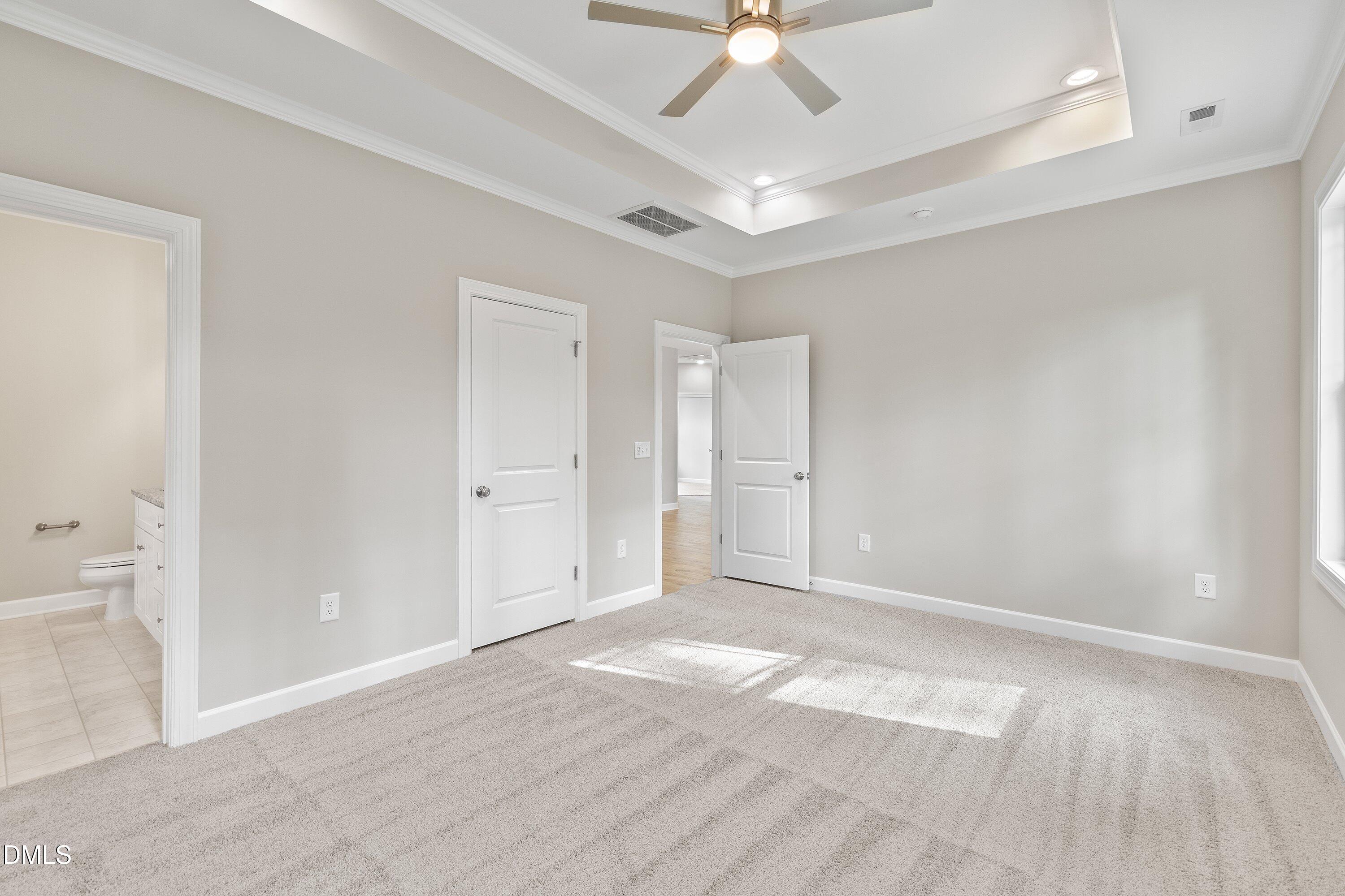 1115 Nor-Am Road Pikeville, NC 27863 - Photo 27 of 40 a view of an empty room and a chandelier fan