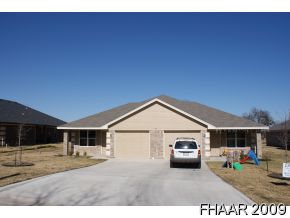 a house view with a outdoor space