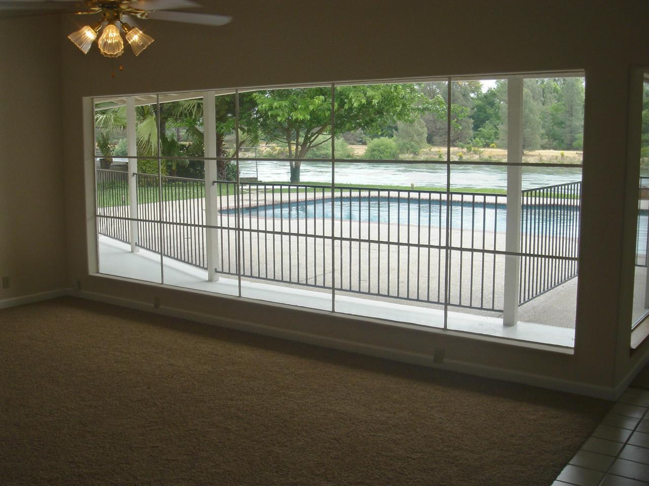 6341 Riverside Drive Redding, CA 96001 - Photo 13 of 20 a view of a large window with an outdoor space