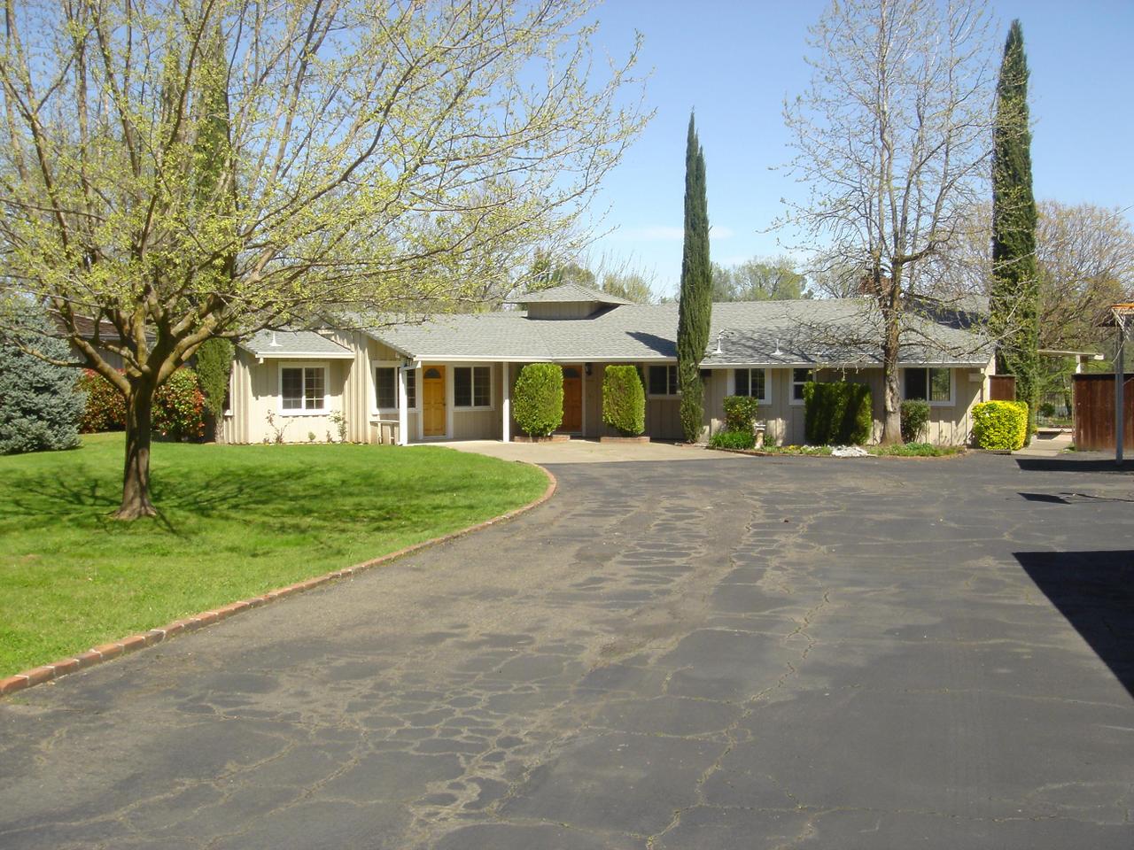 6341 Riverside Drive Redding, CA 96001 - Photo 3 of 20 a view of residential houses with yard and tree s