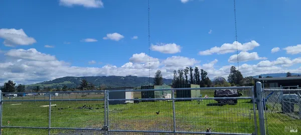 a view of a lake and a yard
