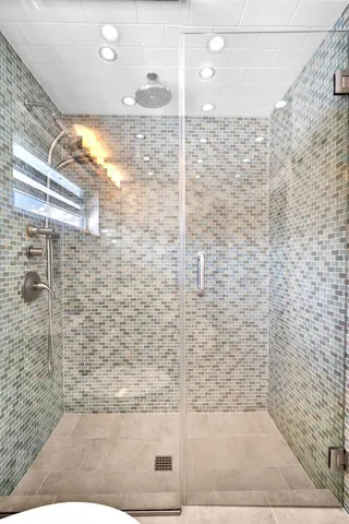 a view of a balcony with wooden floor