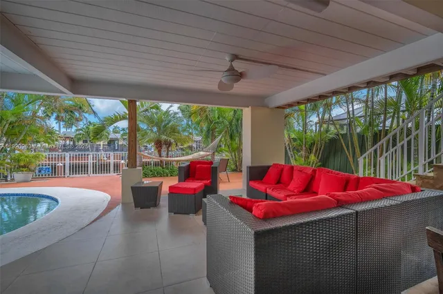 a view of outdoor space yard swimming pool and sitting area