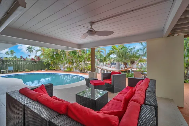 a view of a house with swimming pool