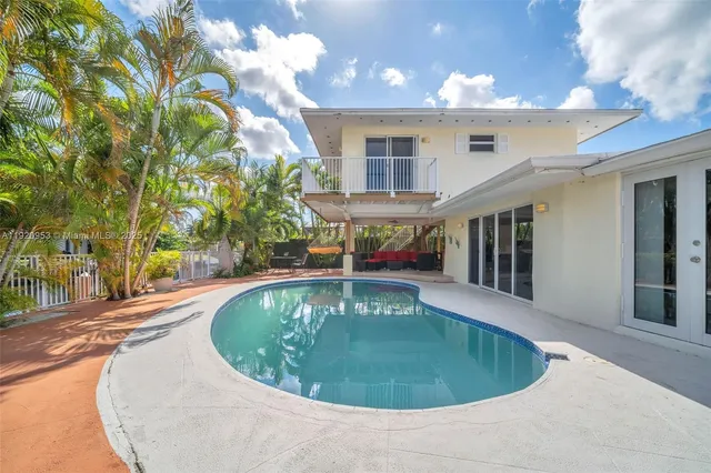 a view of a house with a lake view