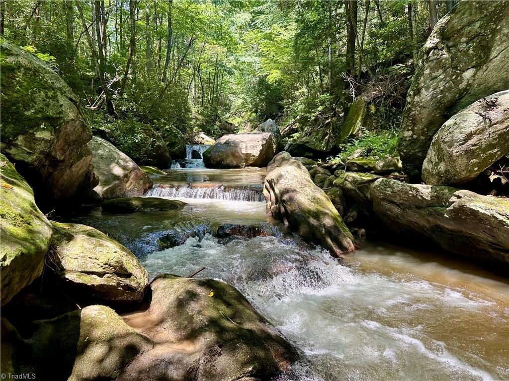 Lot 31 Cascade Run Purlear, NC 28665 - Photo 27 of 34 STUNNING natural waterfalls off of hiking trail