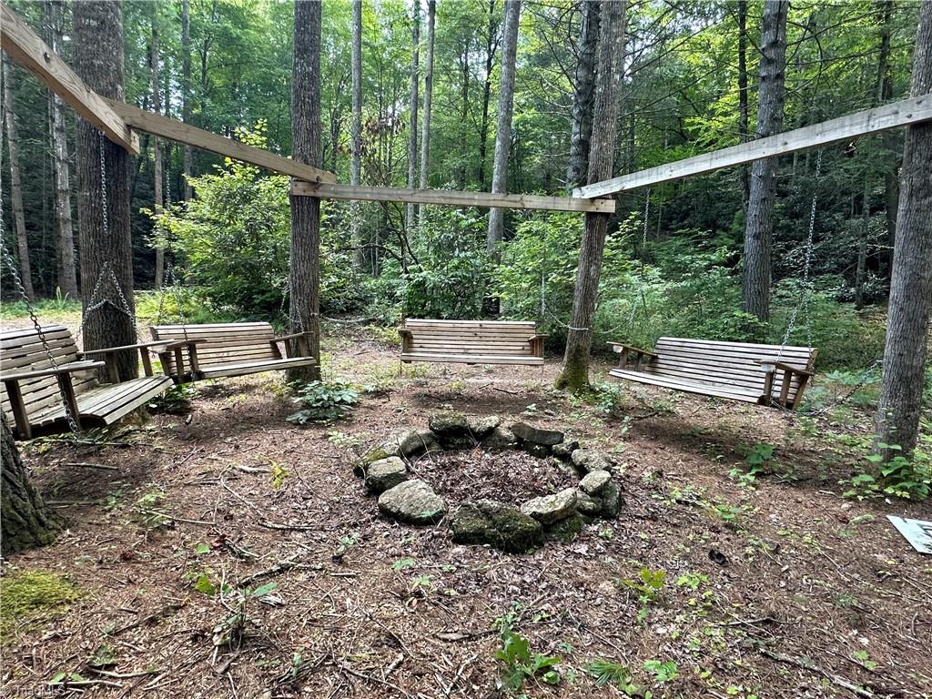 Lot 31 Cascade Run Purlear, NC 28665 - Photo 29 of 34 Community swings and fire pit