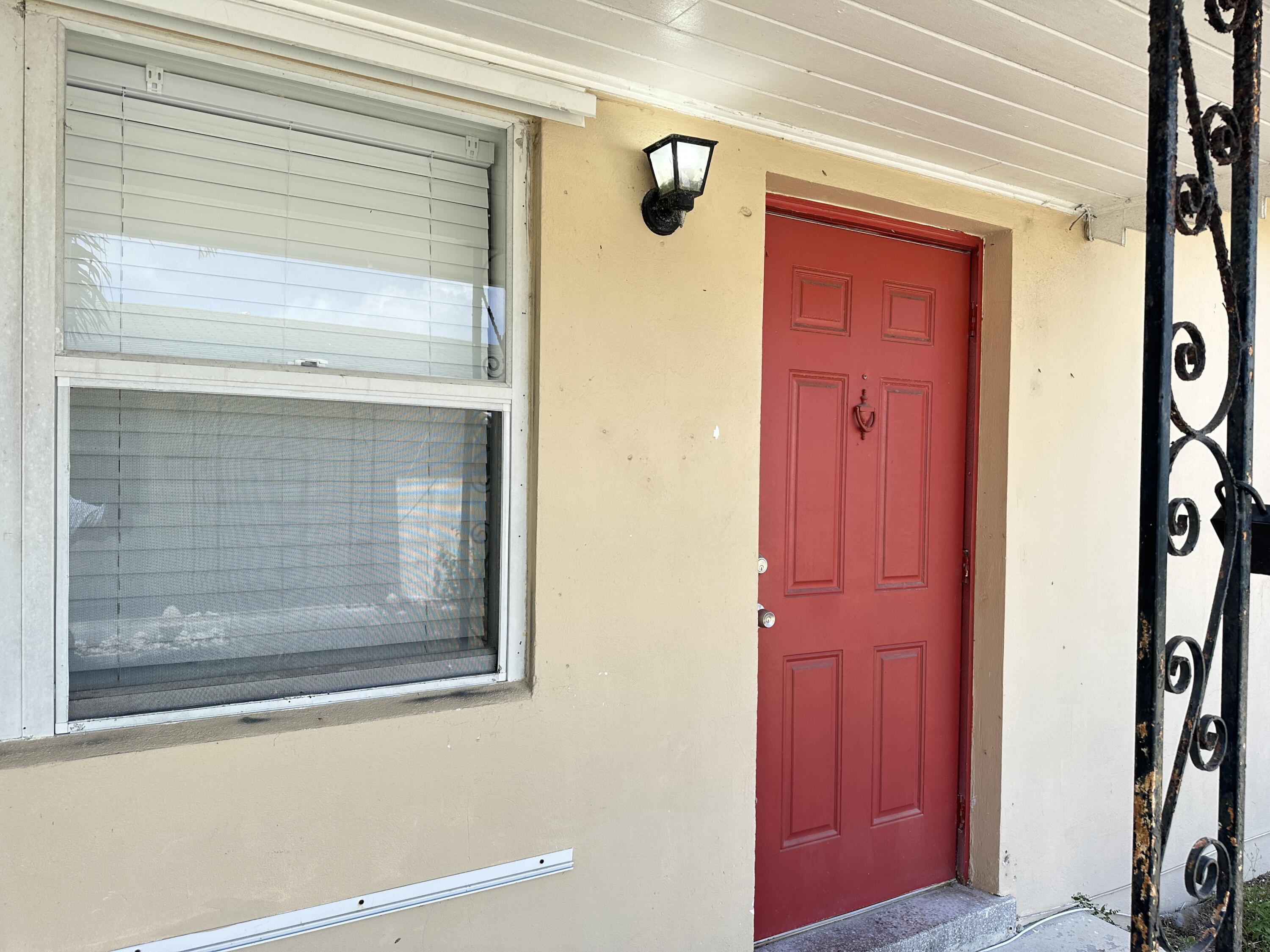 527 Puritan Road, Unit 2 West Palm Beach, FL 33405 - Photo 2 of 13 IMG_9934