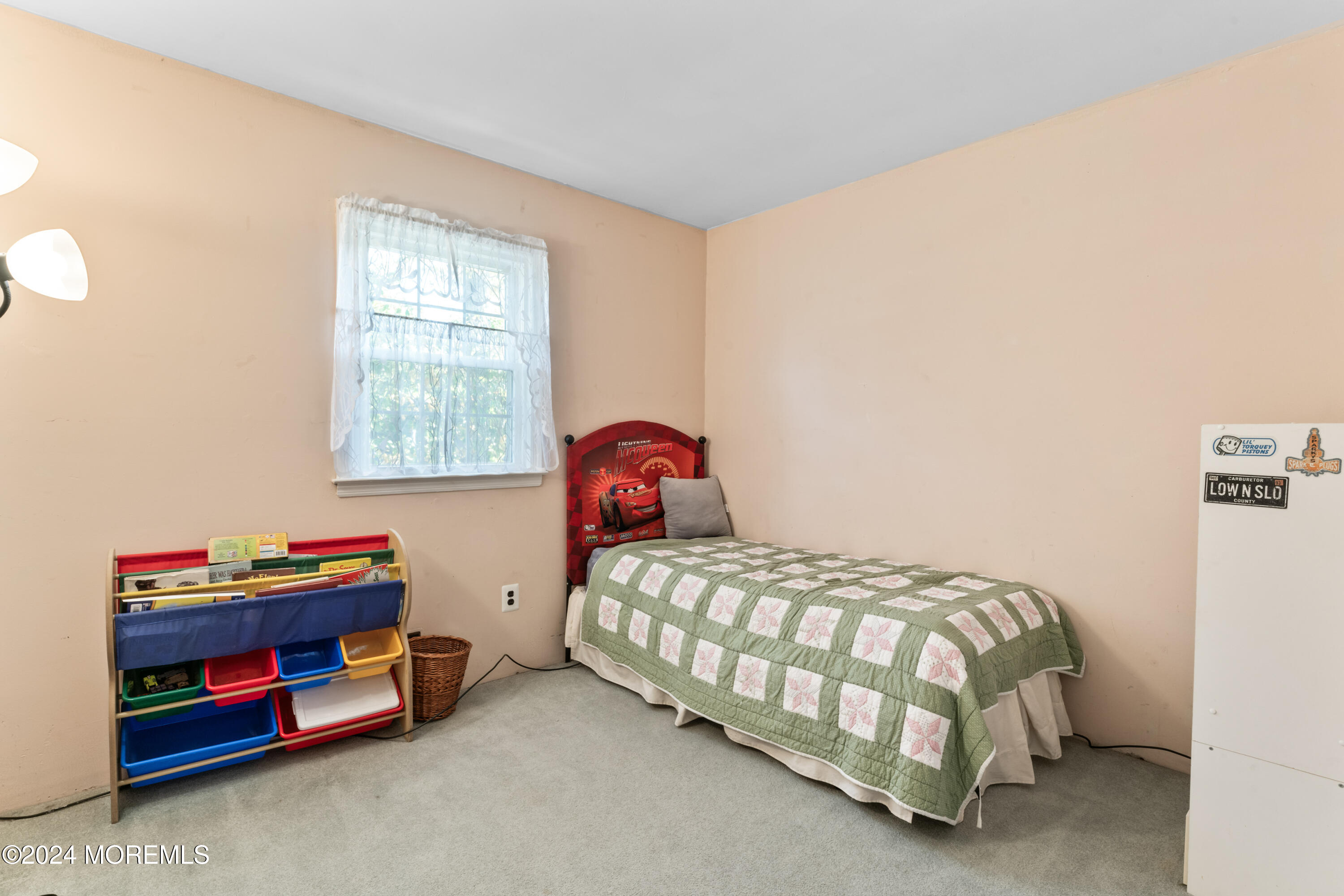 407 Reedy Drive Brick, NJ 08723 - Photo 13 of 35 a bedroom with a bed and a dresser
