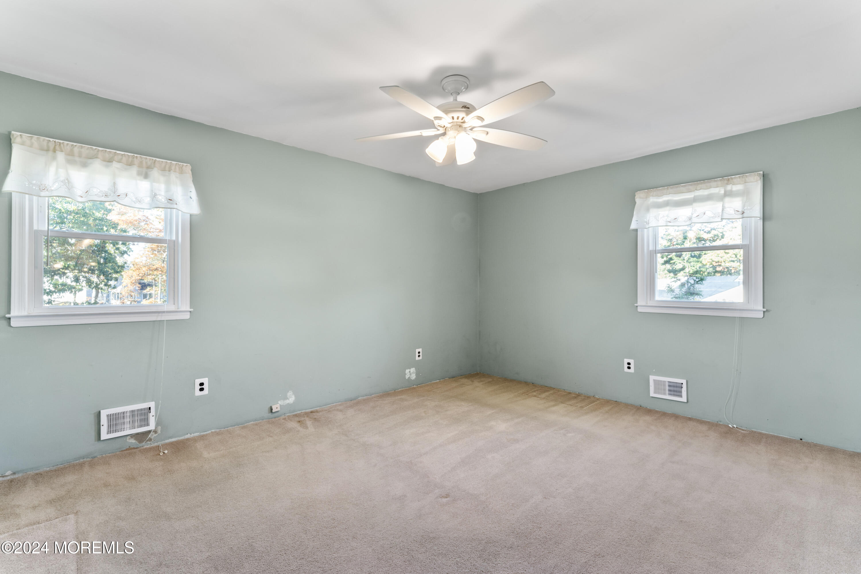 407 Reedy Drive Brick, NJ 08723 - Photo 18 of 35 a view of an empty room with a window