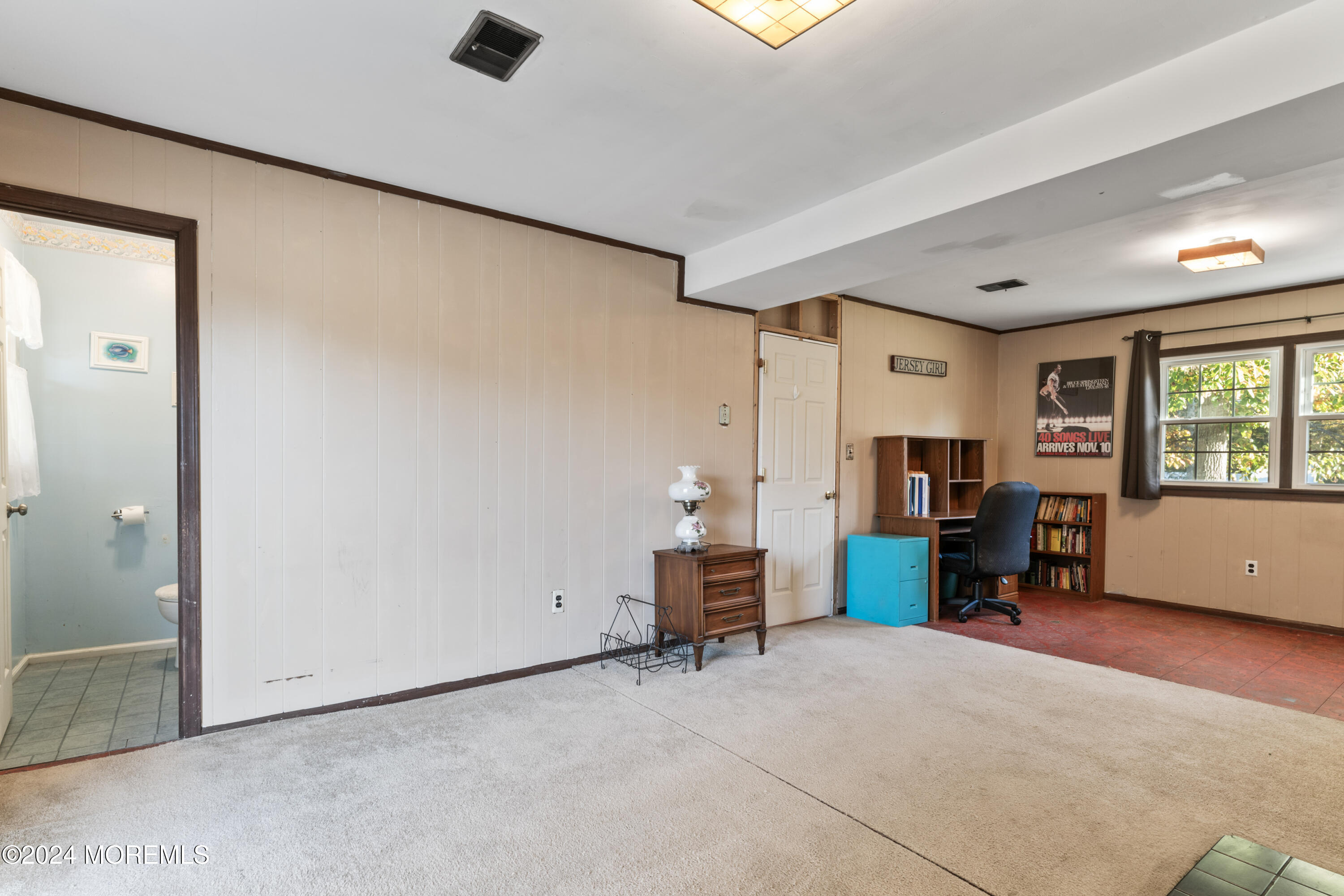 407 Reedy Drive Brick, NJ 08723 - Photo 21 of 35 a view of a livingroom with furniture and a flat screen tv