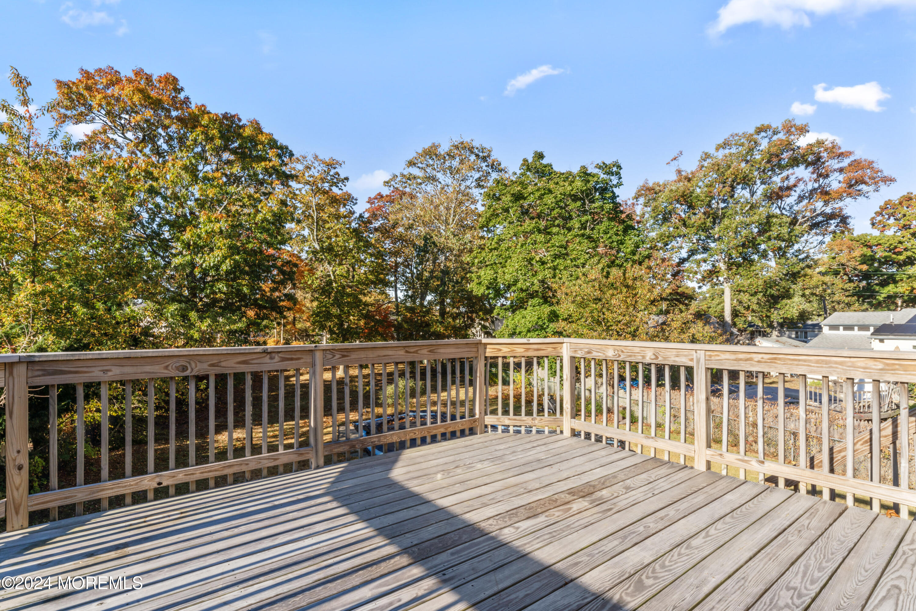 407 Reedy Drive Brick, NJ 08723 - Photo 27 of 35 a view of balcony with wooden floor