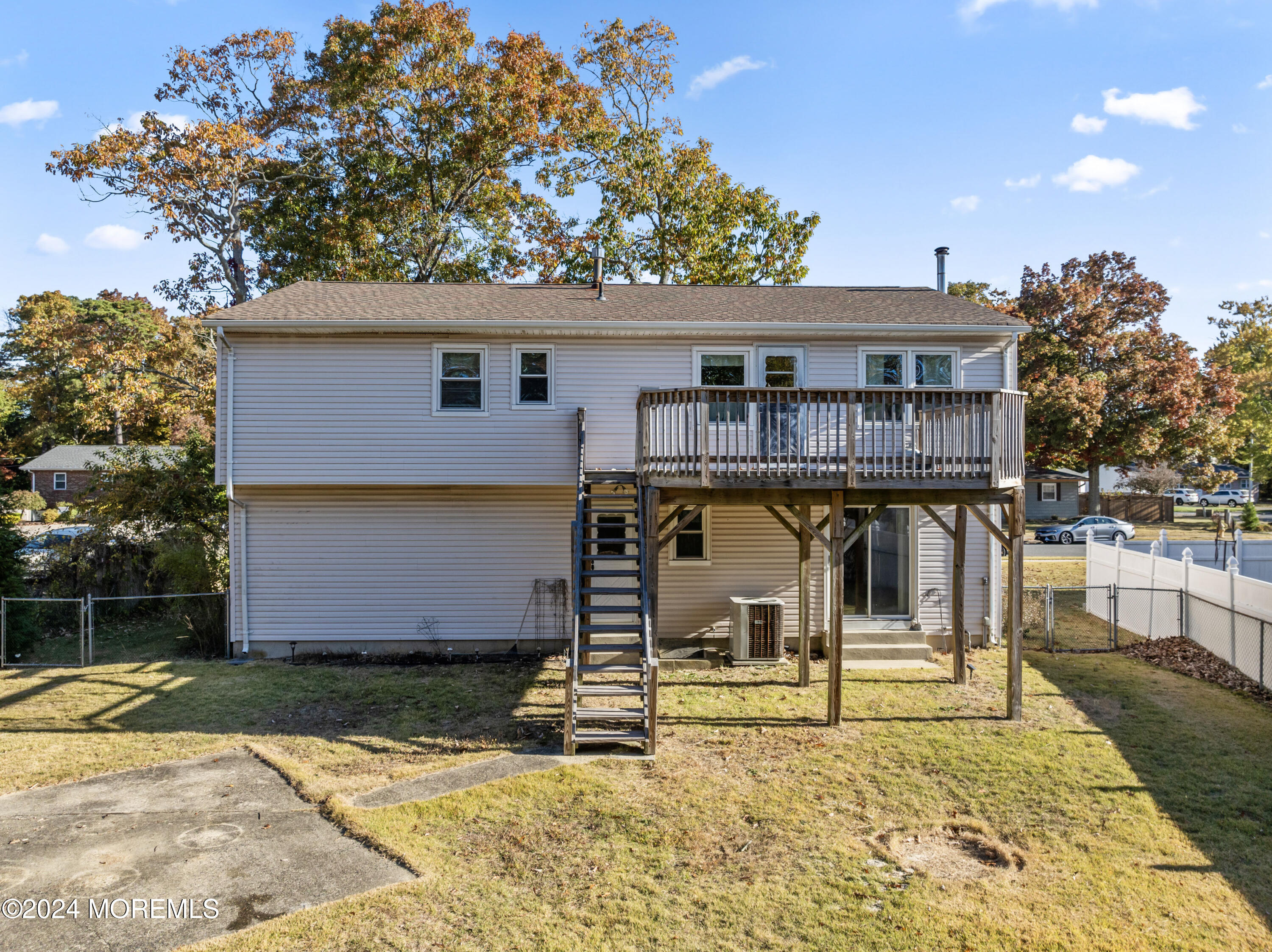 407 Reedy Drive Brick, NJ 08723 - Photo 28 of 35 a view of a house with backyard porch and sitting area