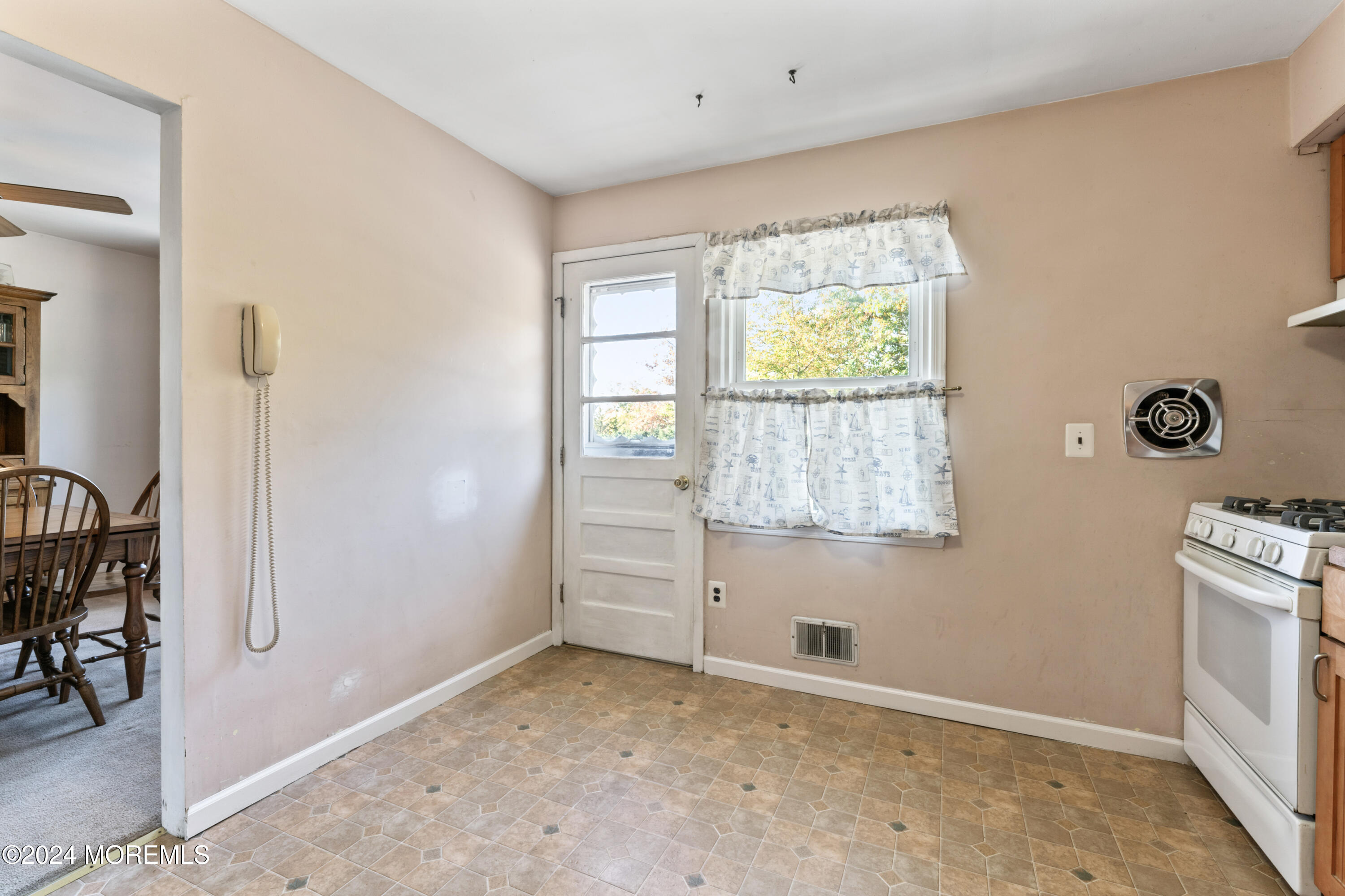 407 Reedy Drive Brick, NJ 08723 - Photo 8 of 35 a view of an empty room with a window