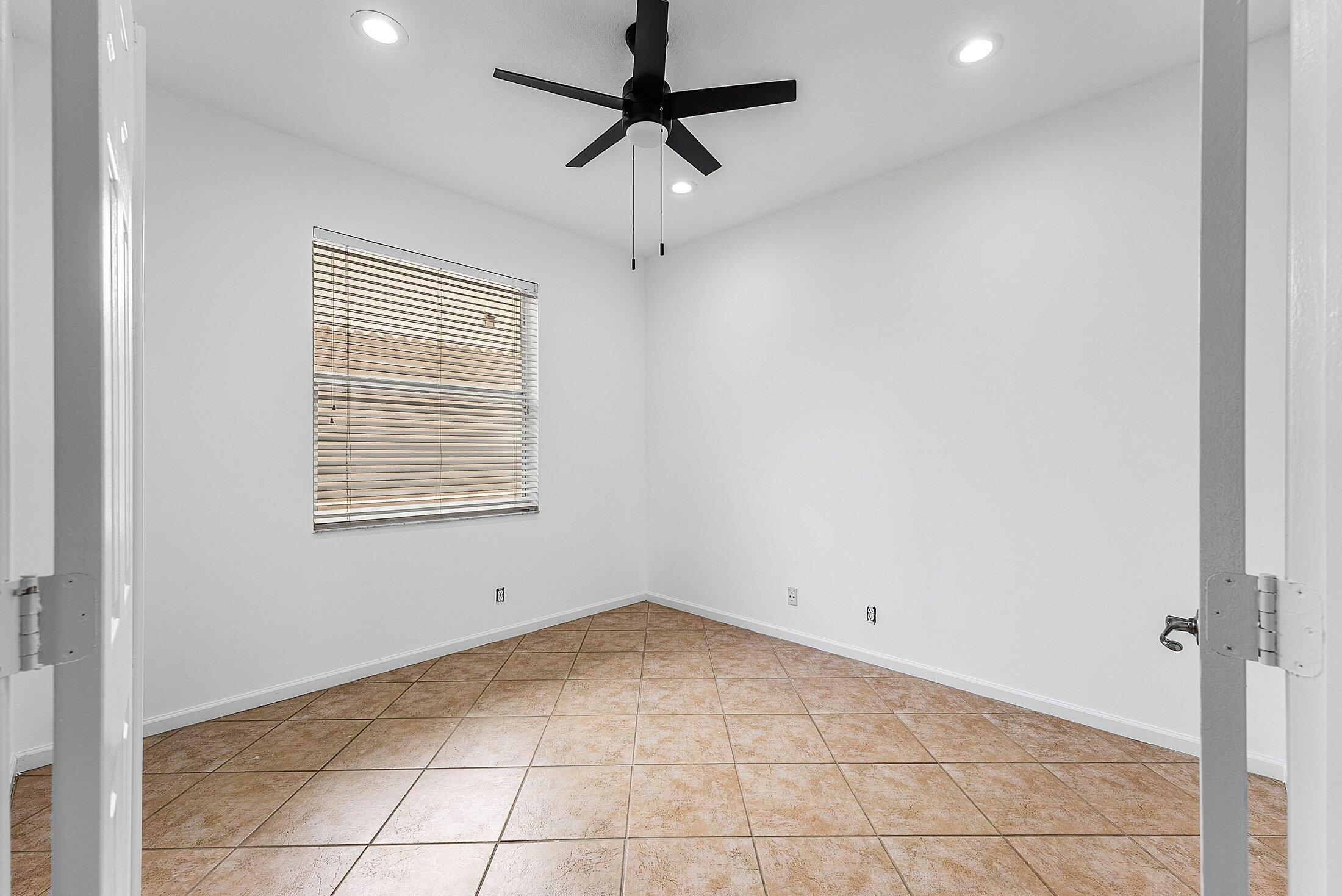 9724 Vineyard Court Boca Raton, FL 33428 - Photo 20 of 56 1st Floor bedroom