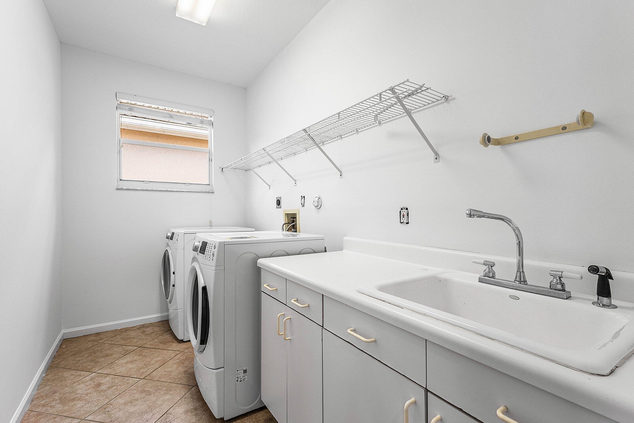 9724 Vineyard Court Boca Raton, FL 33428 - Photo 32 of 56 Laundry Room