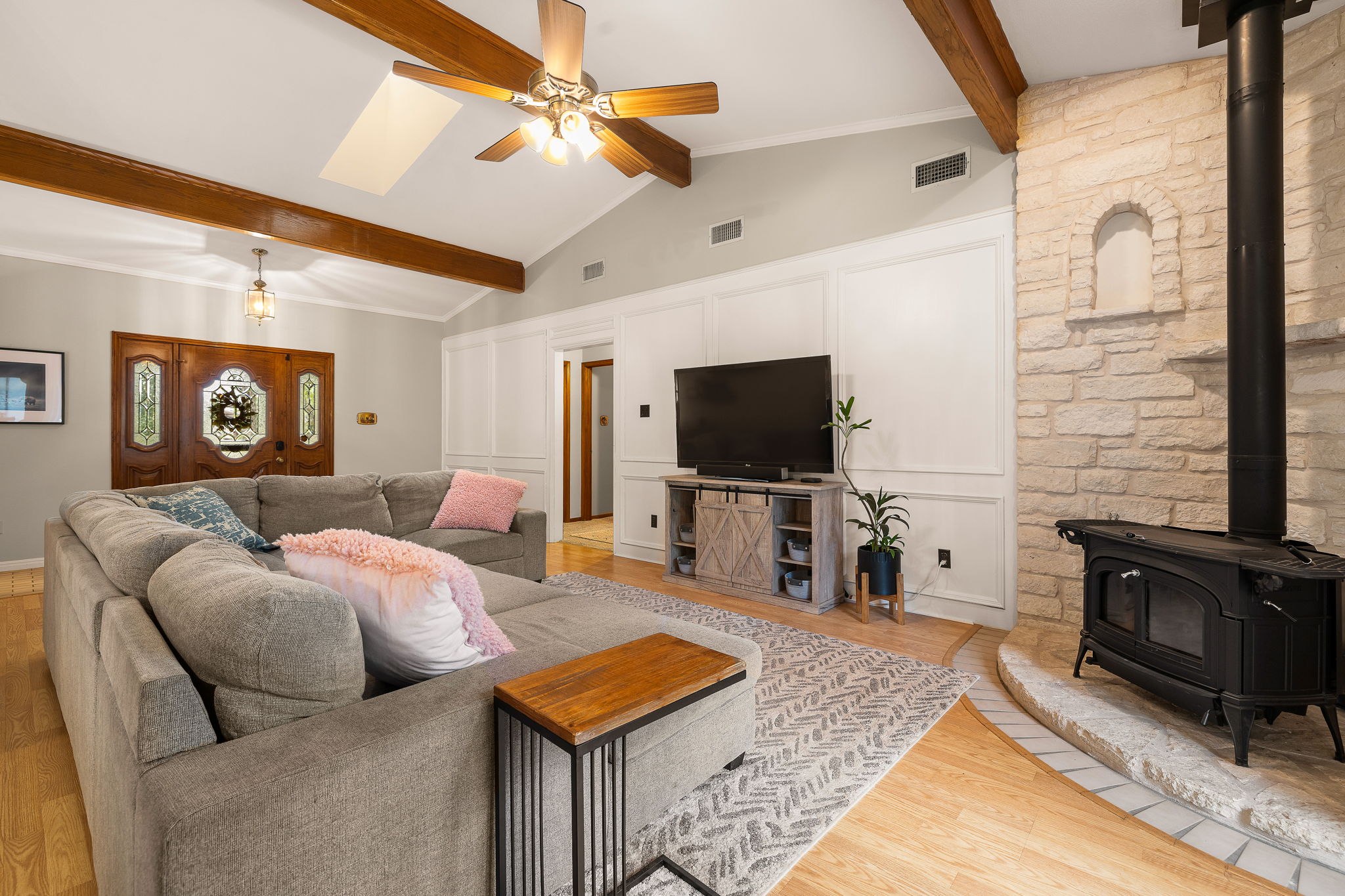 136 Valley View Road Georgetown, TX 78633 - Photo 11 of 40 Another view of this large space. The wood burning stove makes it feel special and cozy even though the room is quite spacious.