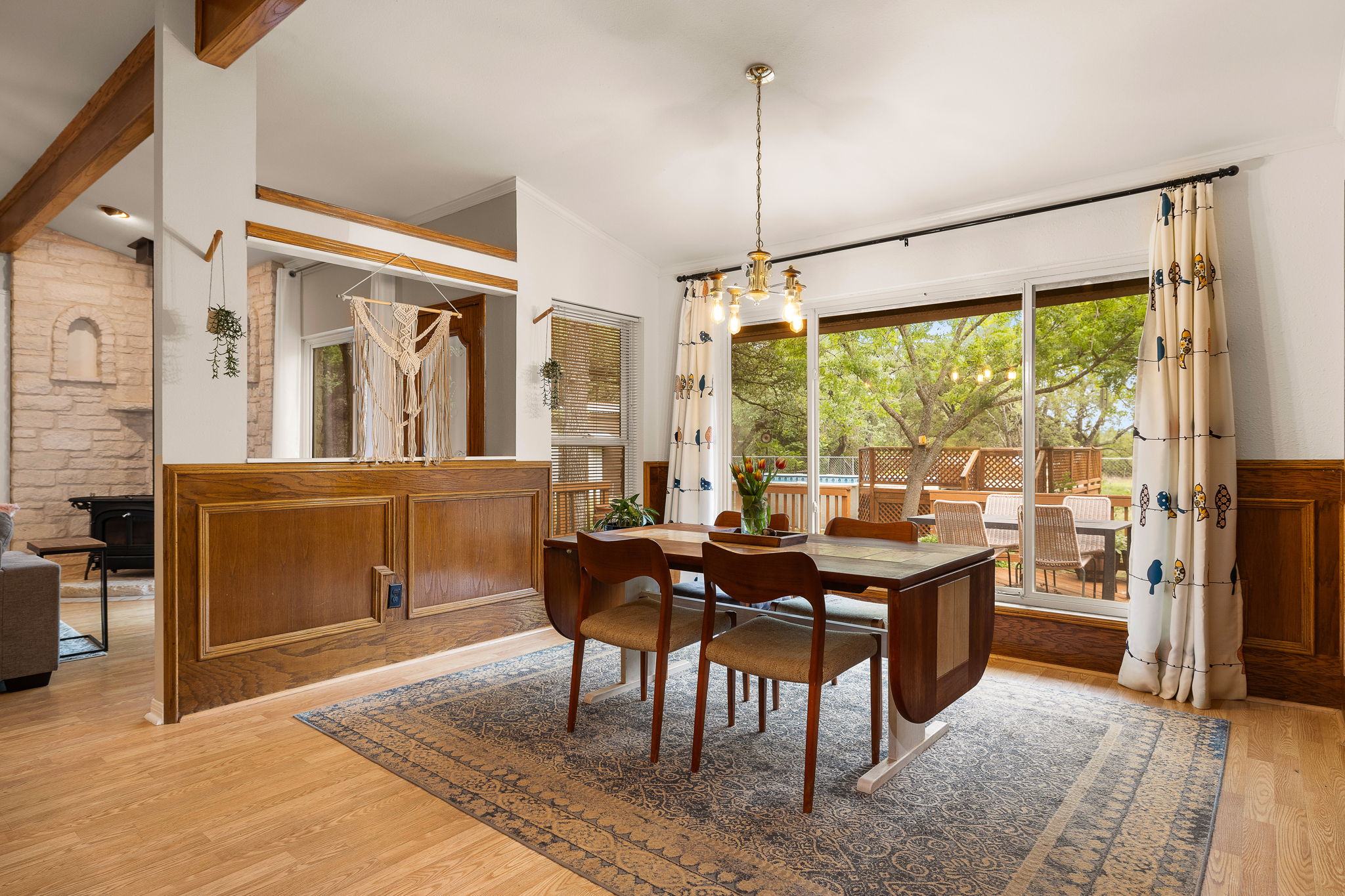 136 Valley View Road Georgetown, TX 78633 - Photo 3 of 40 Beautiful open dining room with huge wall of windows to look out at your gorgeous property and the abundant wildlife....even painted buntings visit!