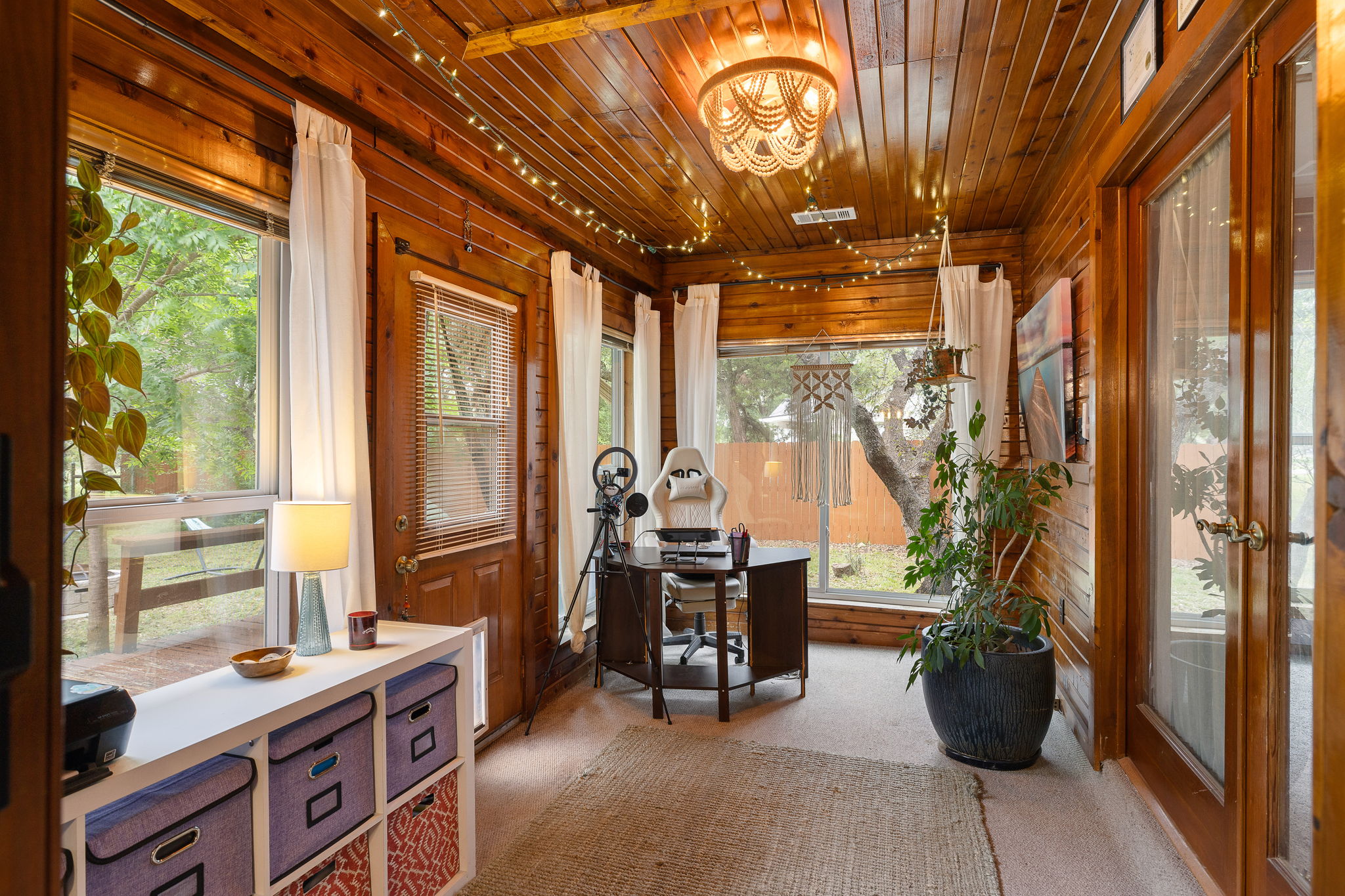 136 Valley View Road Georgetown, TX 78633 - Photo 5 of 40 Love this groovy sunroom! Currently used as an office and podcast creation room, it has so many possible uses!