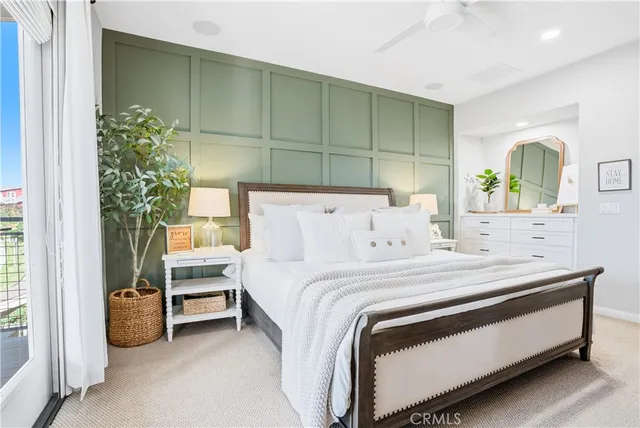 a bathroom with a granite countertop sink a mirror a vanity and shower