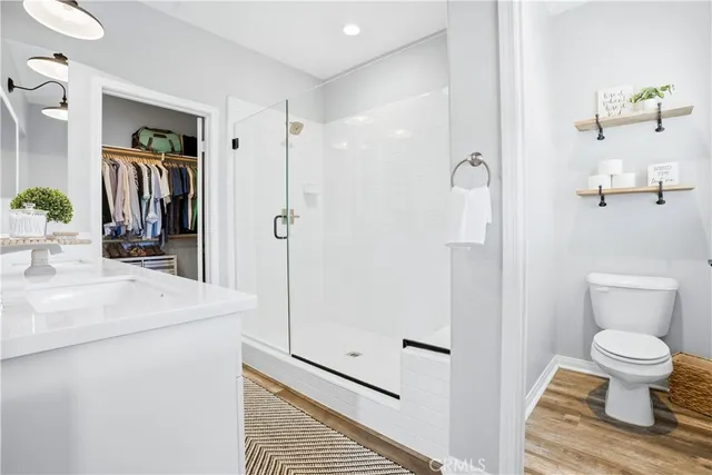 a bathroom with a sink double vanity and a mirror