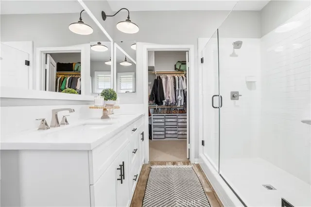 a bedroom with a bed and a book shelf