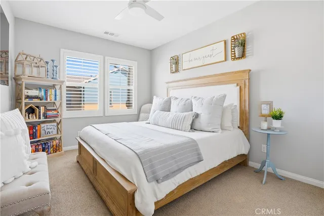 a view of a big yard in front of a brick building