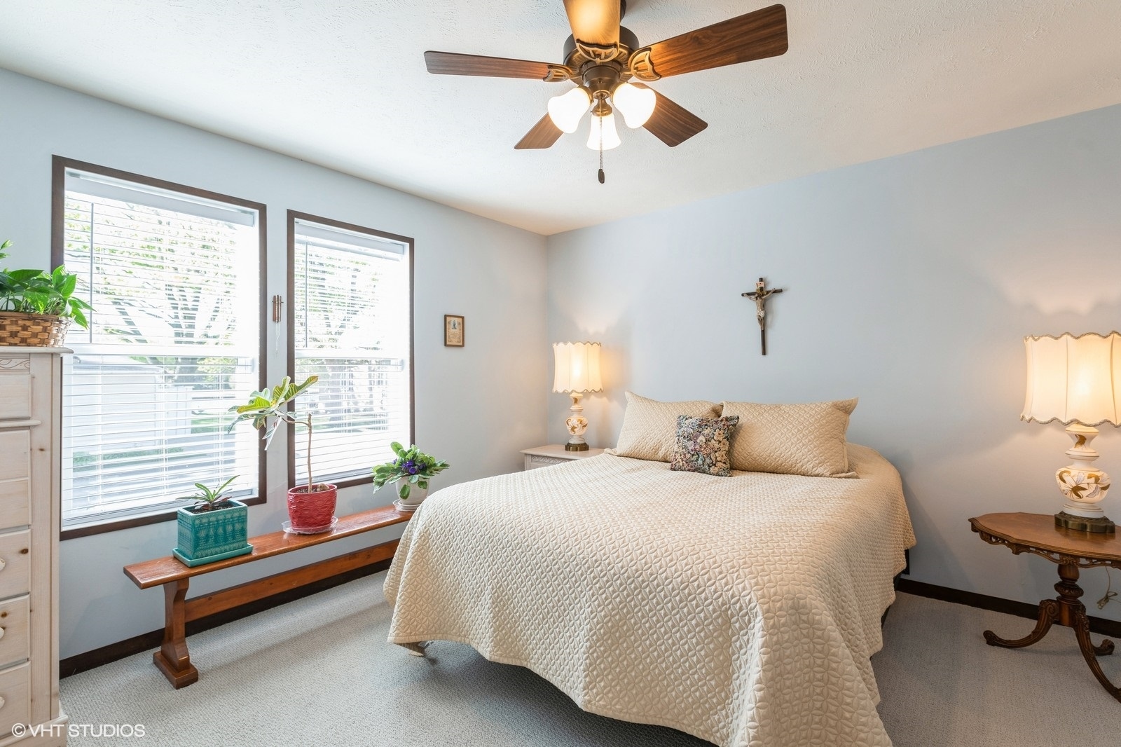 206 Big Peninsula Road Elgin, IL 60123 - Photo 10 of 23 a bedroom with a bed and a chandelier