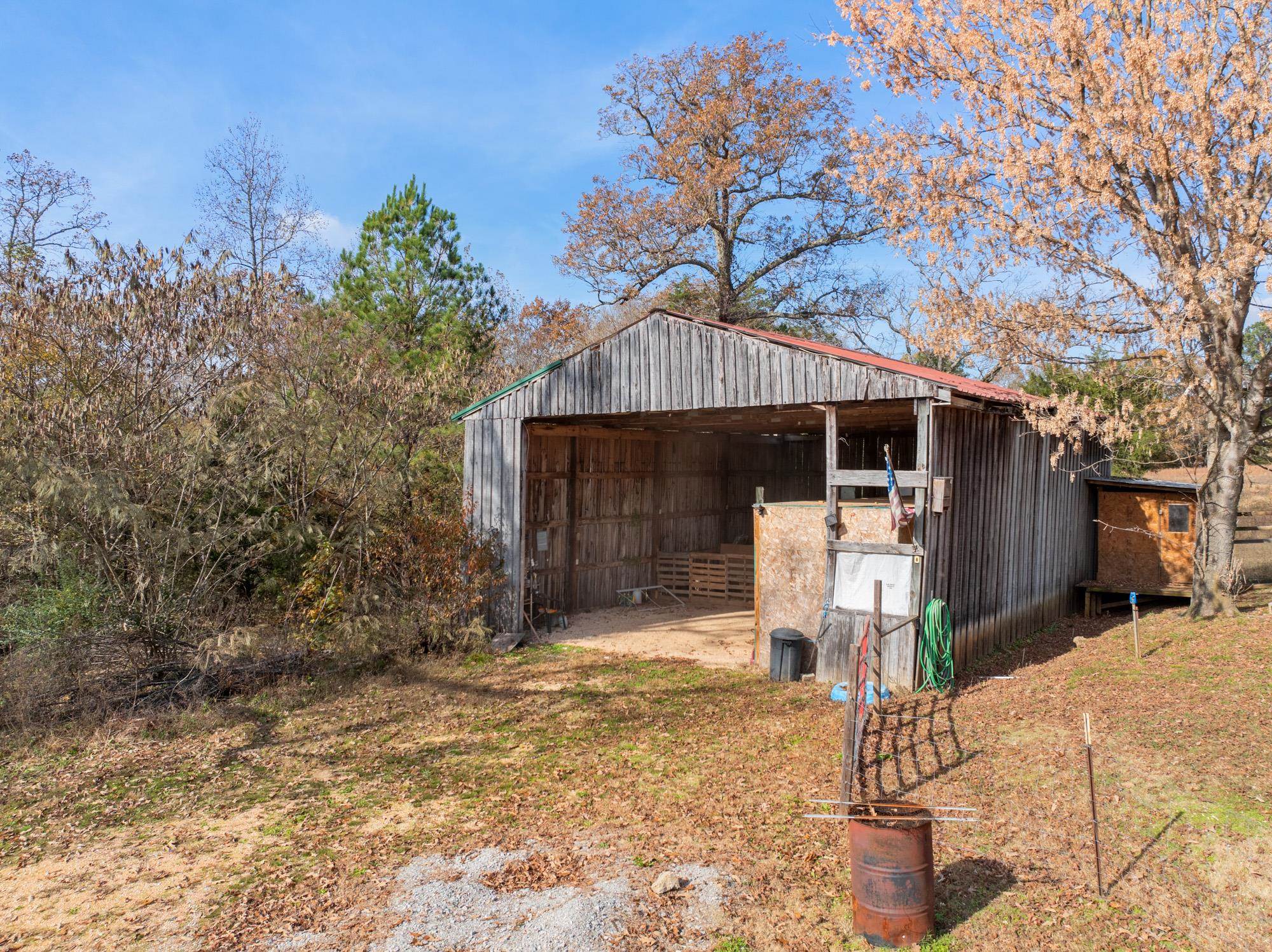 875 Lindsey Road Parsons, TN 38363 - Photo 27 of 38 a front view of a house with garden