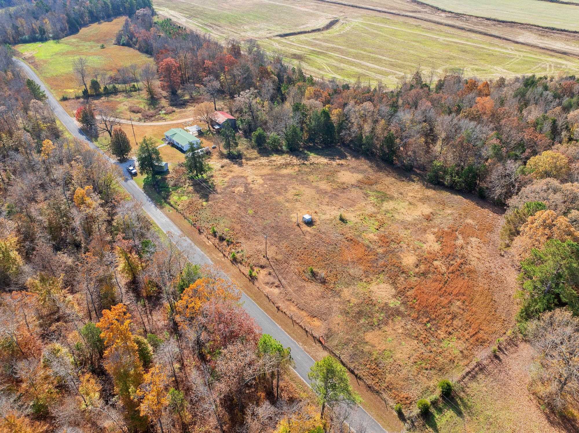 875 Lindsey Road Parsons, TN 38363 - Photo 31 of 38 a view of a yard with wooden fence
