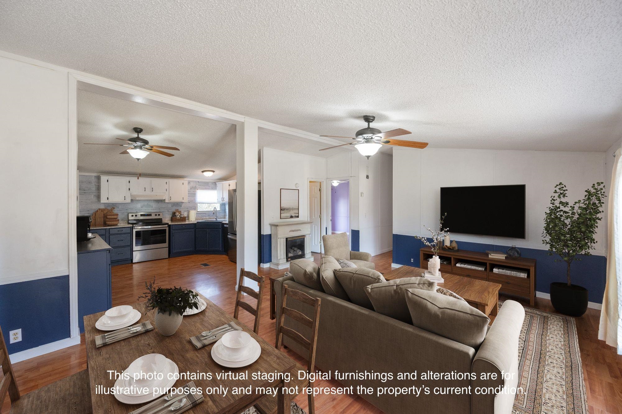 875 Lindsey Road Parsons, TN 38363 - Photo 6 of 38 a living room with furniture and a flat screen tv