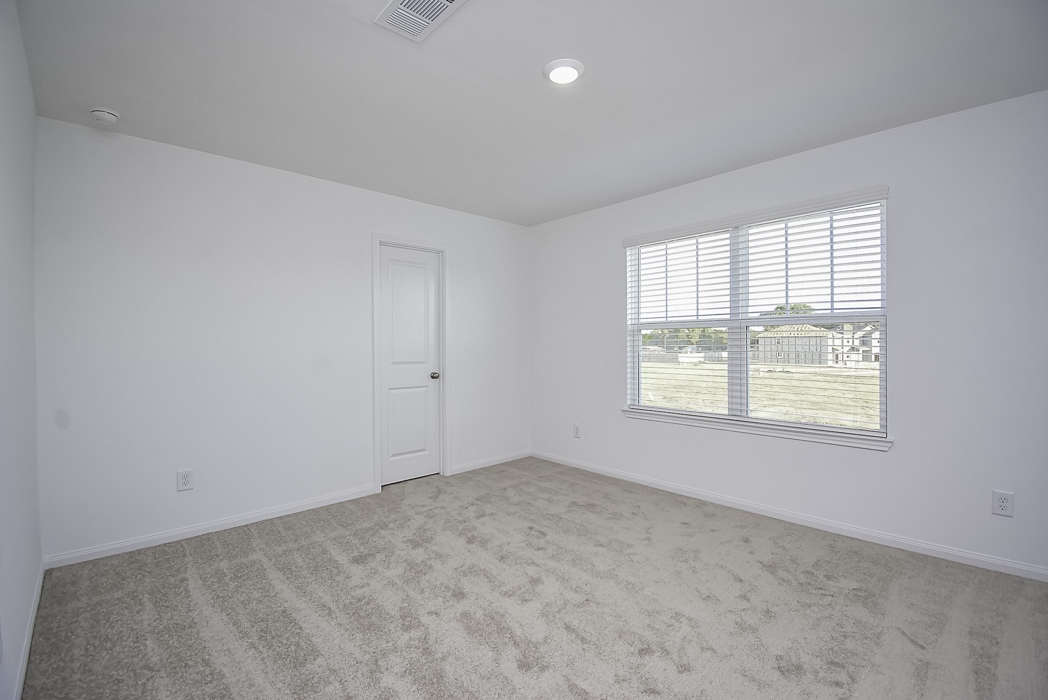 23407 Honey Spade Road Hockley, TX 77447 - Photo 13 of 34 an empty room with a window