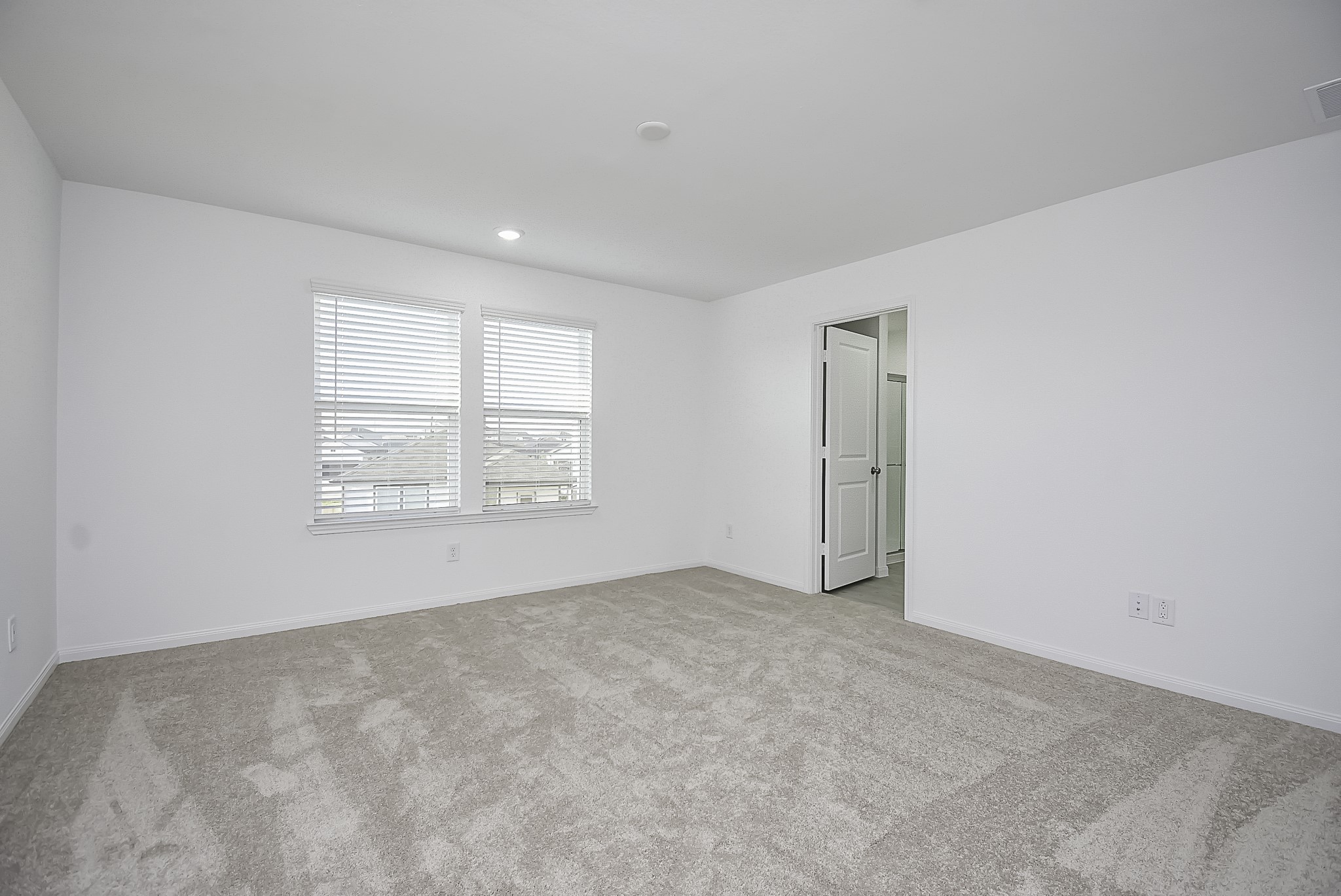 23407 Honey Spade Road Hockley, TX 77447 - Photo 14 of 34 an empty room with windows