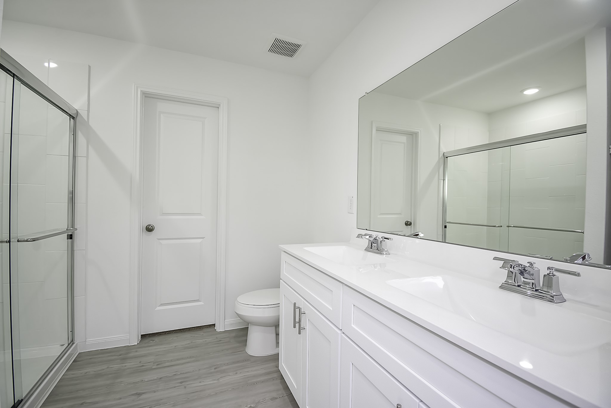 23407 Honey Spade Road Hockley, TX 77447 - Photo 19 of 34 a bathroom with a sink and a mirror