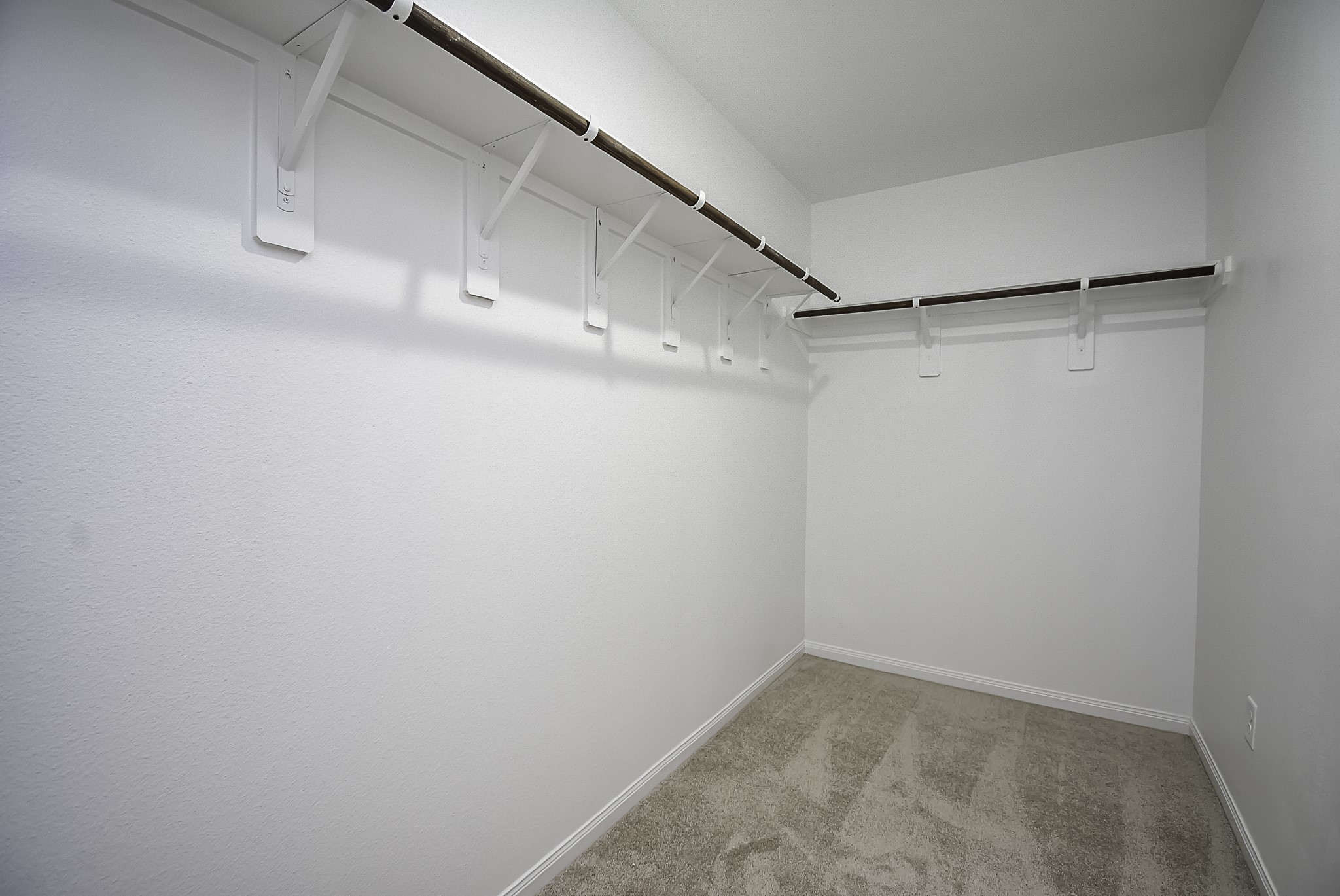 23407 Honey Spade Road Hockley, TX 77447 - Photo 22 of 34 a view of a room with racks on the wall