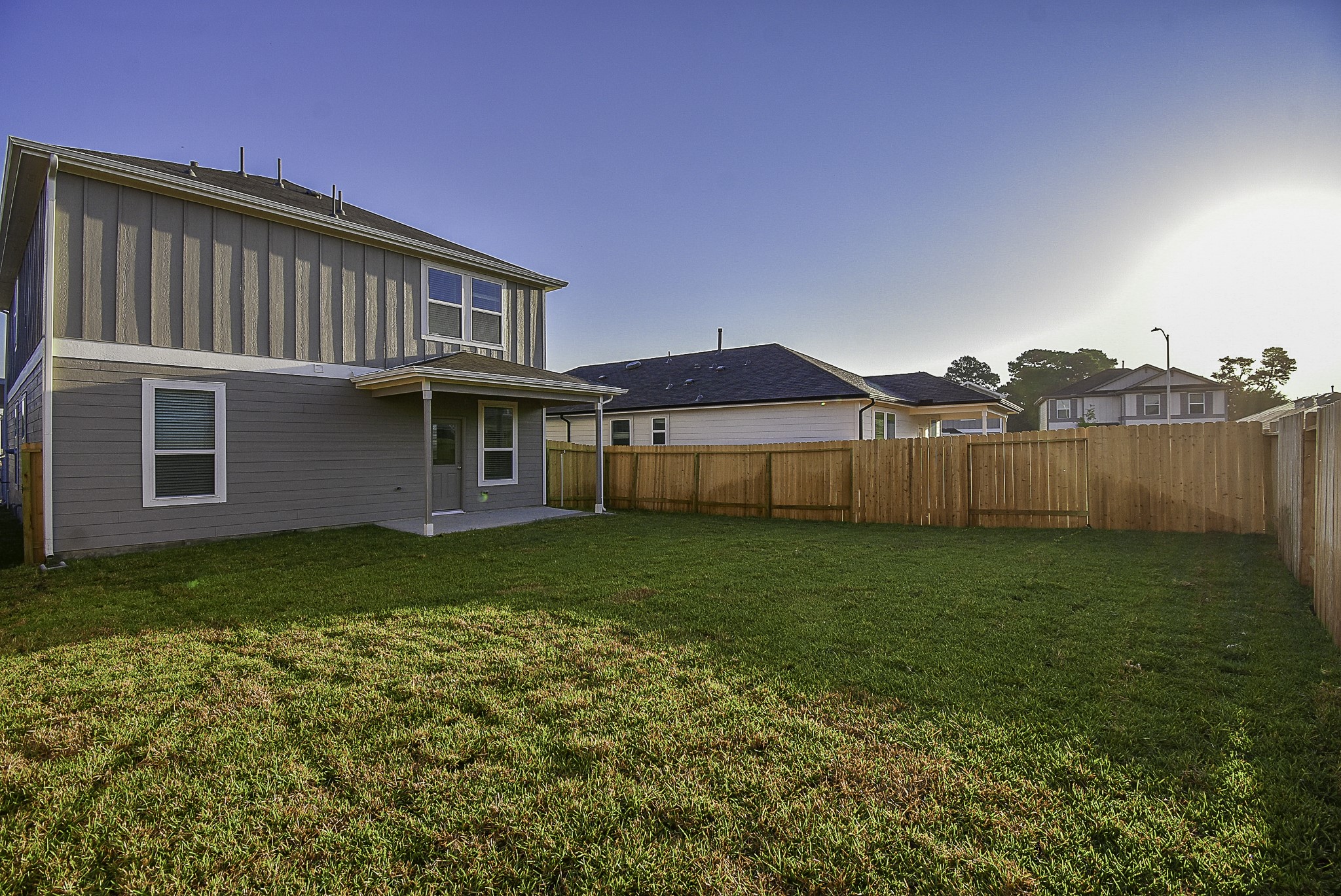 23407 Honey Spade Road Hockley, TX 77447 - Photo 23 of 34 a view of a house with a back yard