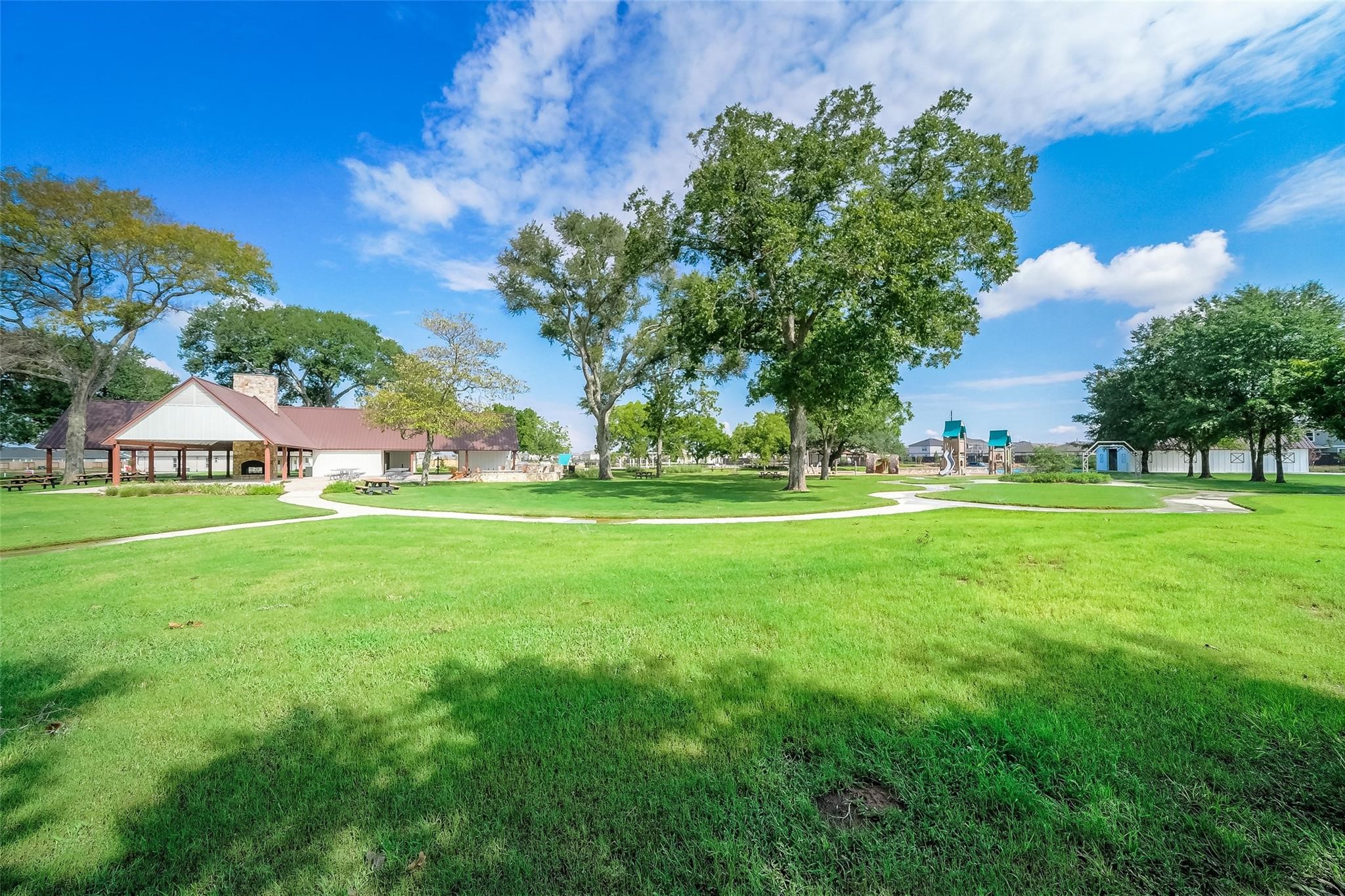 23407 Honey Spade Road Hockley, TX 77447 - Photo 32 of 34 a view of an house with a garden and trees