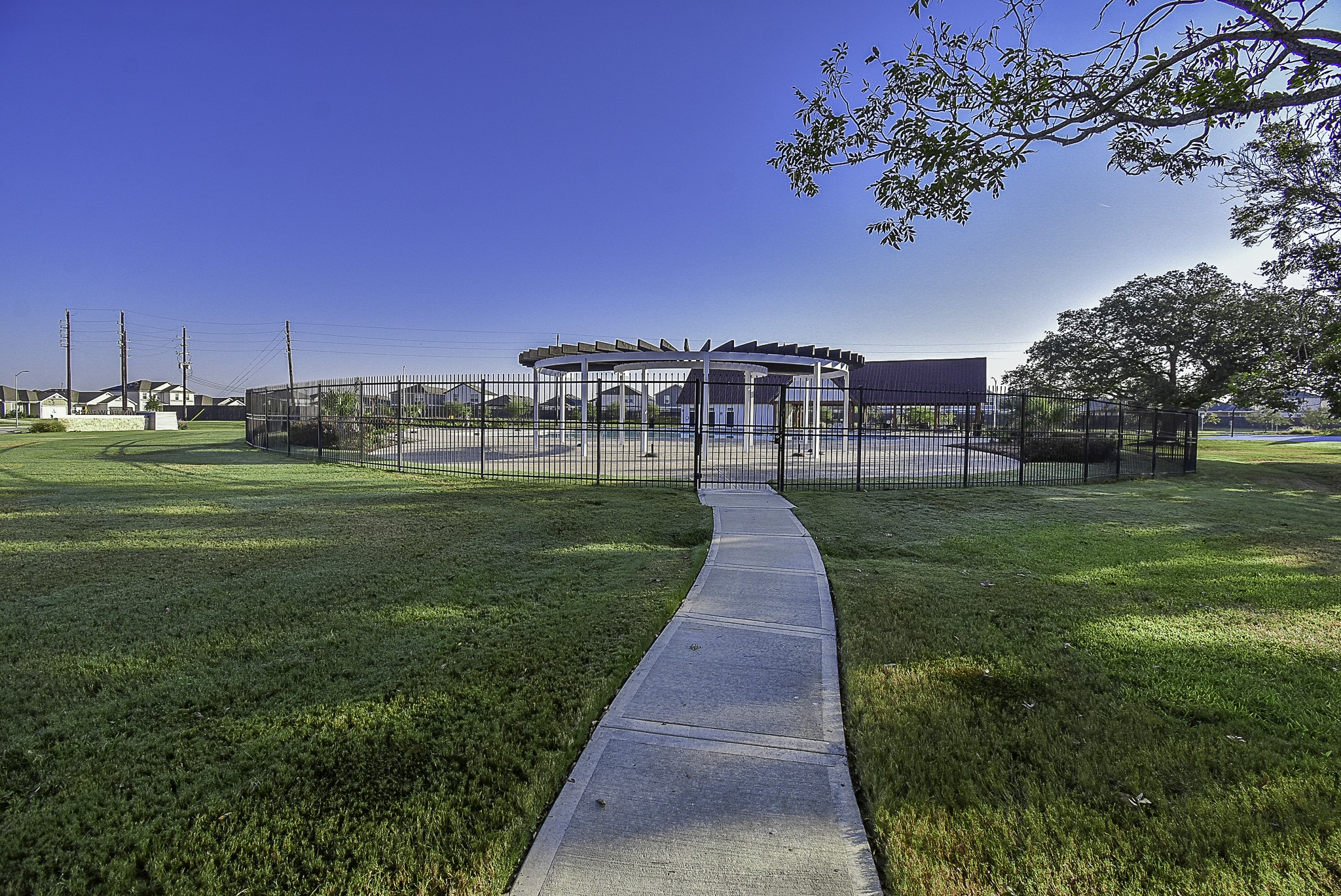 23407 Honey Spade Road Hockley, TX 77447 - Photo 33 of 34 a big yard with lots of green space and trees in the background