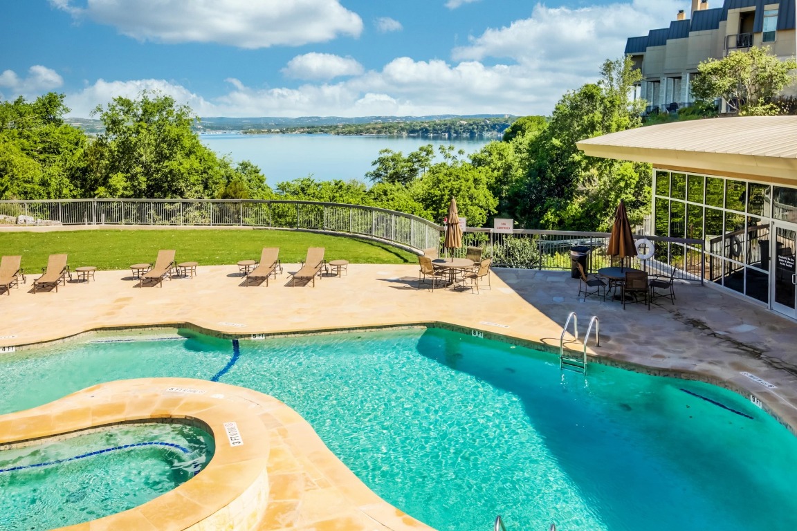 2918 Ranch Road 620, Unit 185 Austin, TX 78734 - Photo 28 of 39 an outdoor space with swimming pool and green space