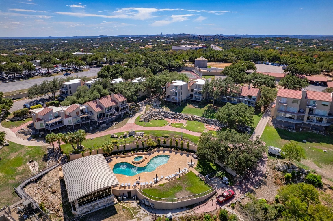 2918 Ranch Road 620, Unit 185 Austin, TX 78734 - Photo 29 of 39 an aerial view of a house with a swimming pool yard and outdoor seating