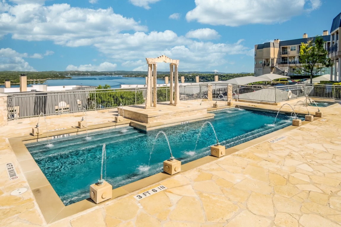 2918 Ranch Road 620, Unit 185 Austin, TX 78734 - Photo 38 of 39 a view of swimming pool with outdoor seating and plants